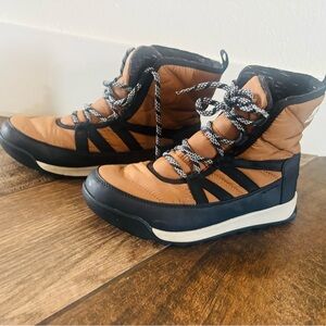 Sorel Tan and Black Winter Boots